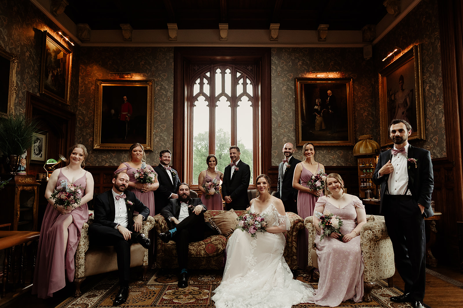 Lauren and Daniel with their wedding party in the drawing room at Markree Castle