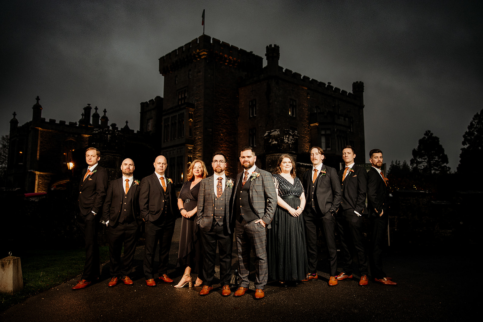 Richard and Conor with their wedding party outside Markree Castle after dark