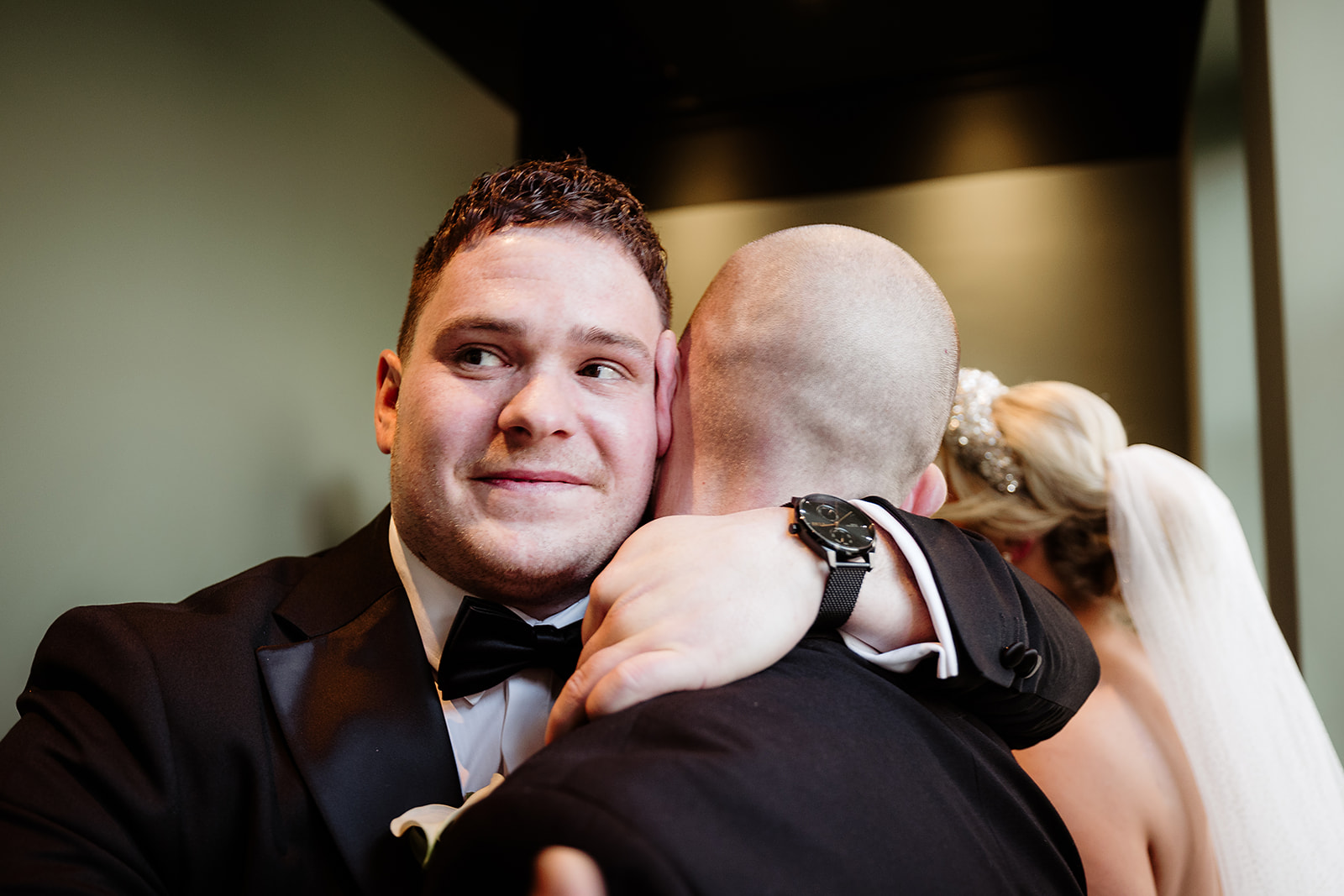 An embrace after Maeve and Neil’s wedding ceremony at The Abbey
