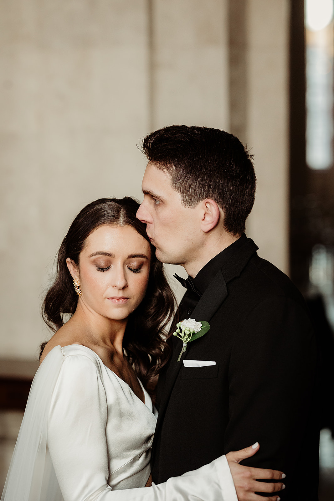Sayeda and Aaron together by a window at Dublin City Hall