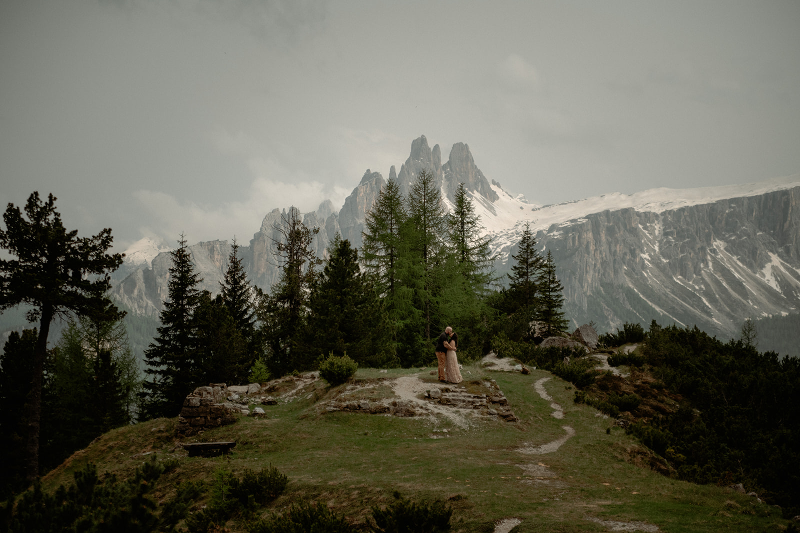 Dolomites proposal in a secluded forest clearing in the mountains