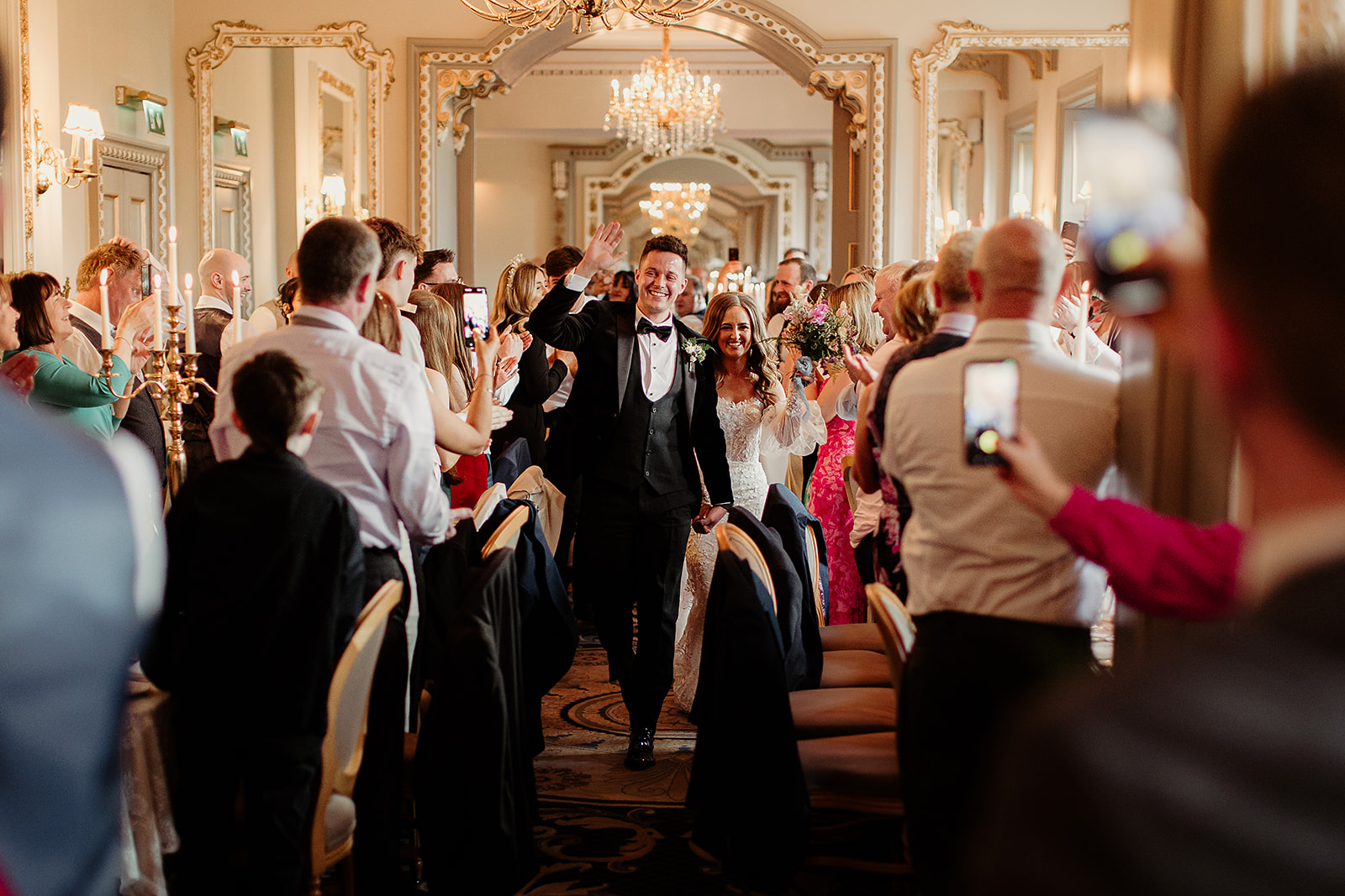 Ciara and John welcomed into the dining room by their guests at Markree Castle