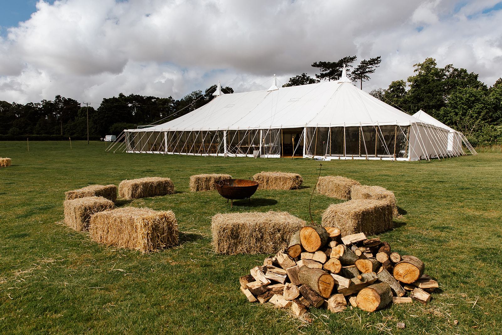 rustic farm wedding with hay bale seating