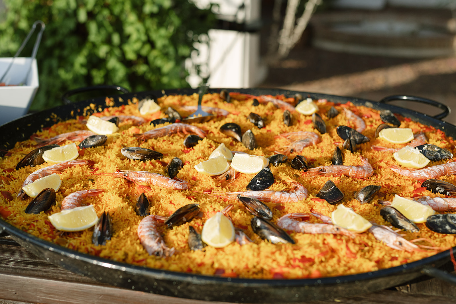 Paella cooked for wedding guests in the garden