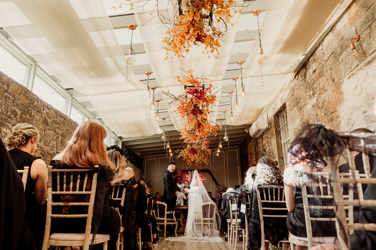 Bella and Shane exchange vows in the Conservatory at Boyne Hill House.