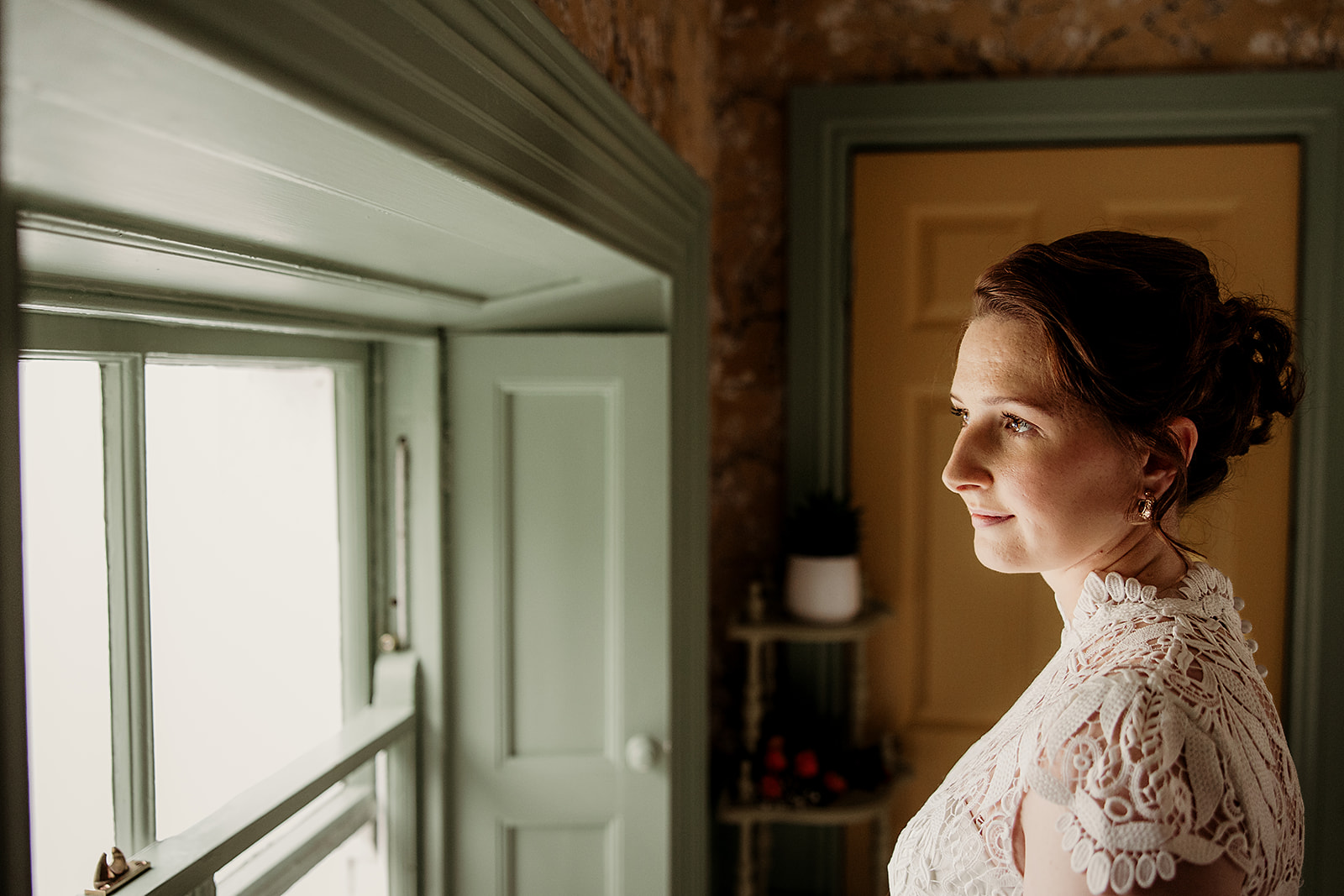 Sinead by the window before her Station House Hotel wedding