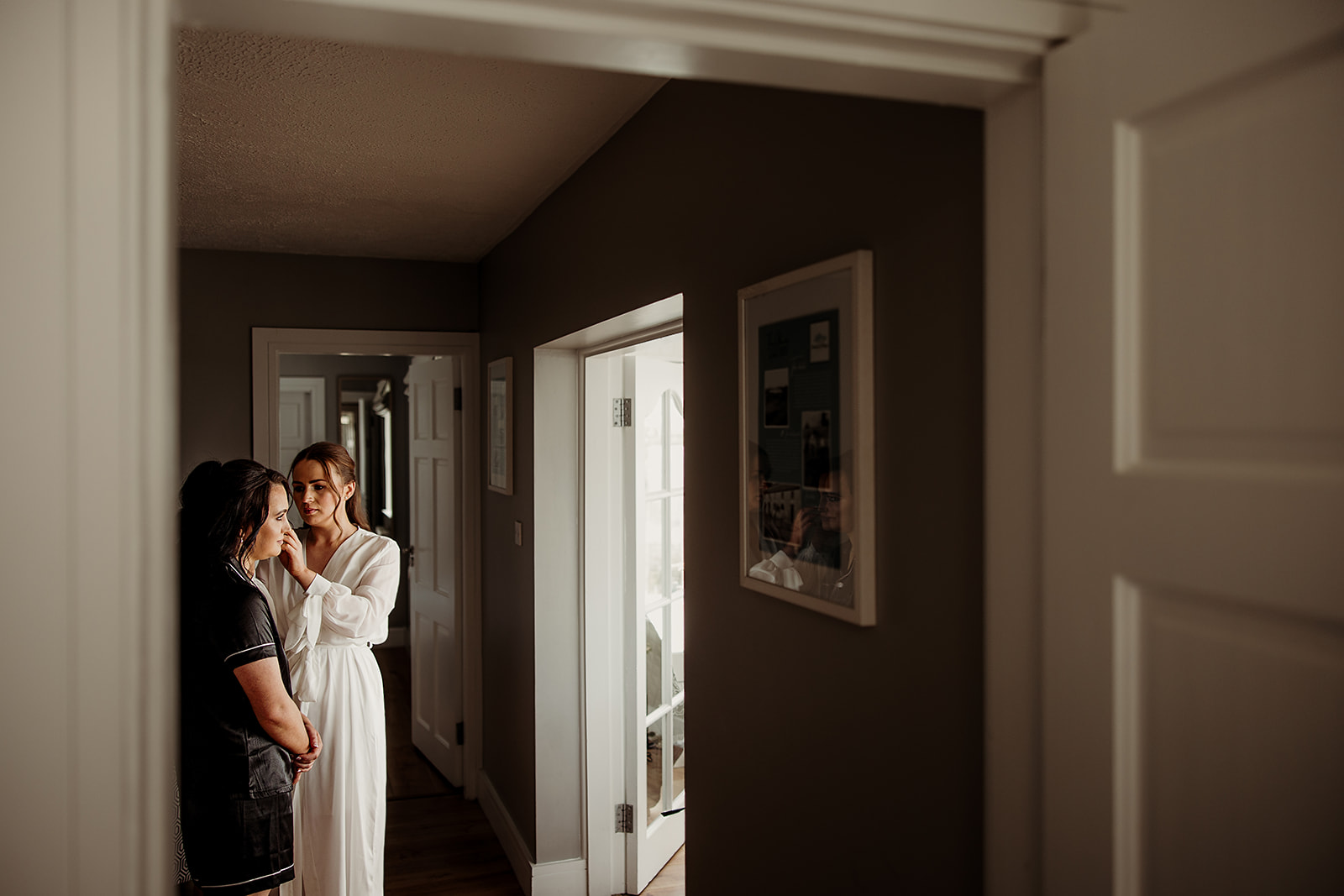 A quiet moment with Alison in the doorway during the morning preparations