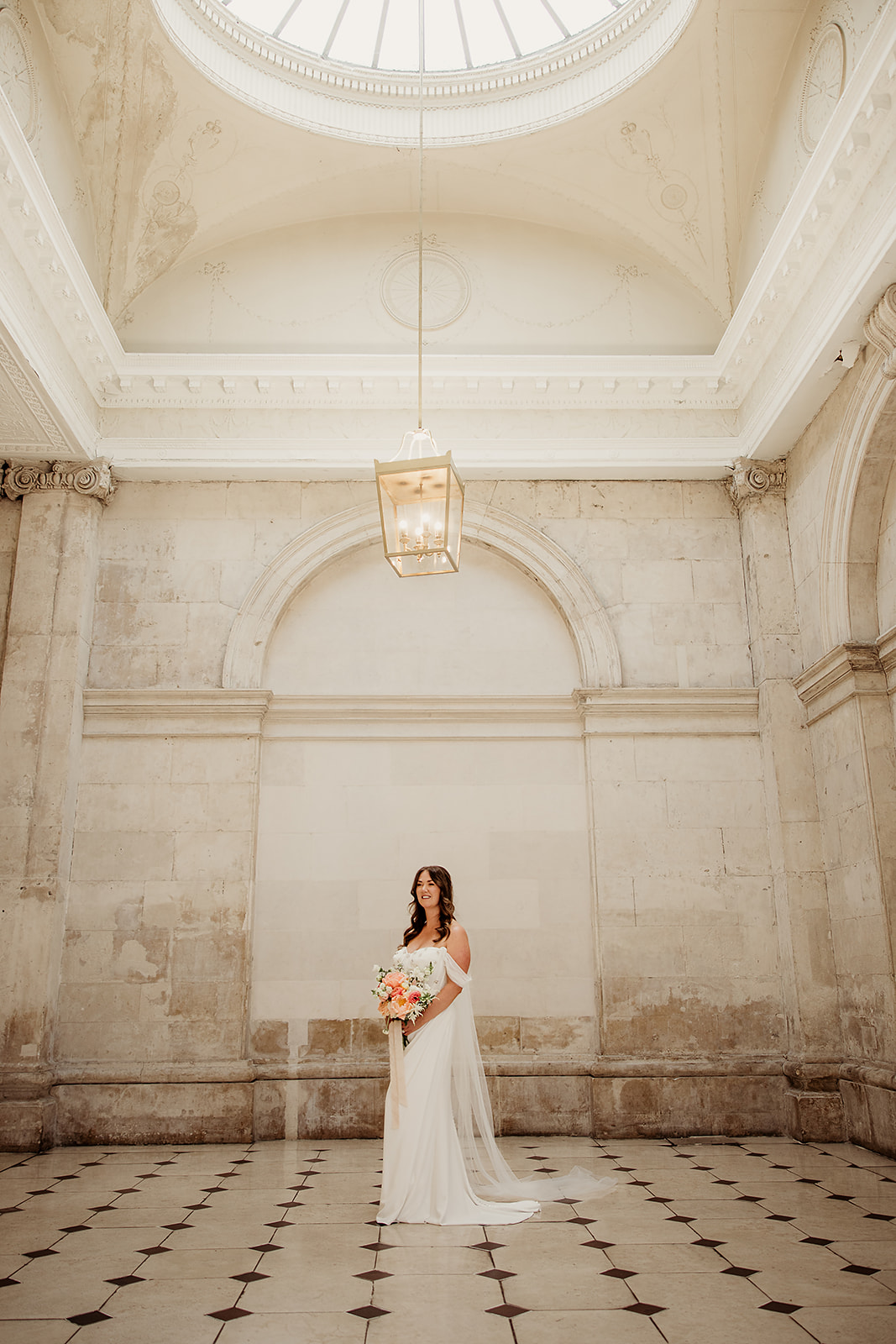 Claire beneath the dome and stone arches at Dublin City Hall