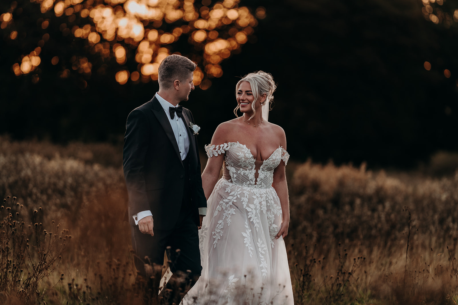 Courtney and Sam in warm sunset light at Hackness Grange