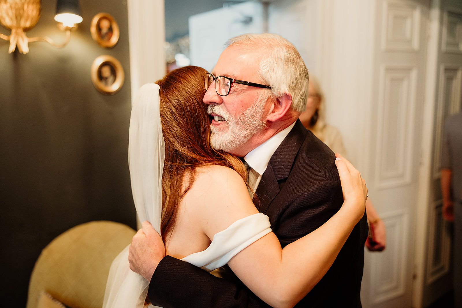 Aoife embraces a wedding guest in the Manor House at Boyne Hill.
