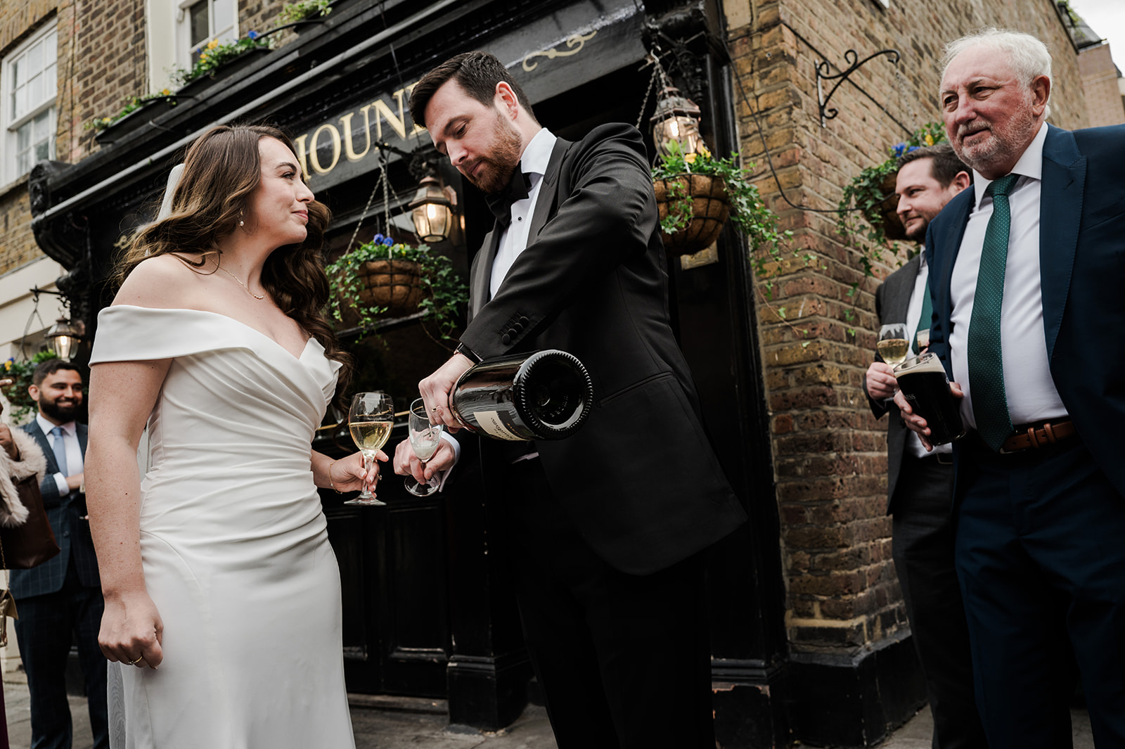 Guests enjoying drinks at Fox and Hounds pub