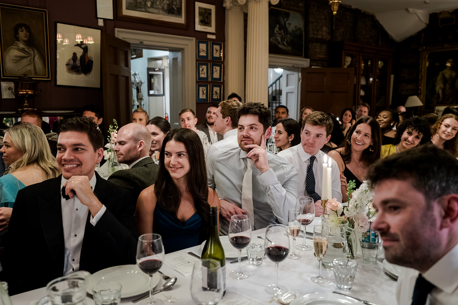 Guests reacting during the wedding speeches at Brunswick House
