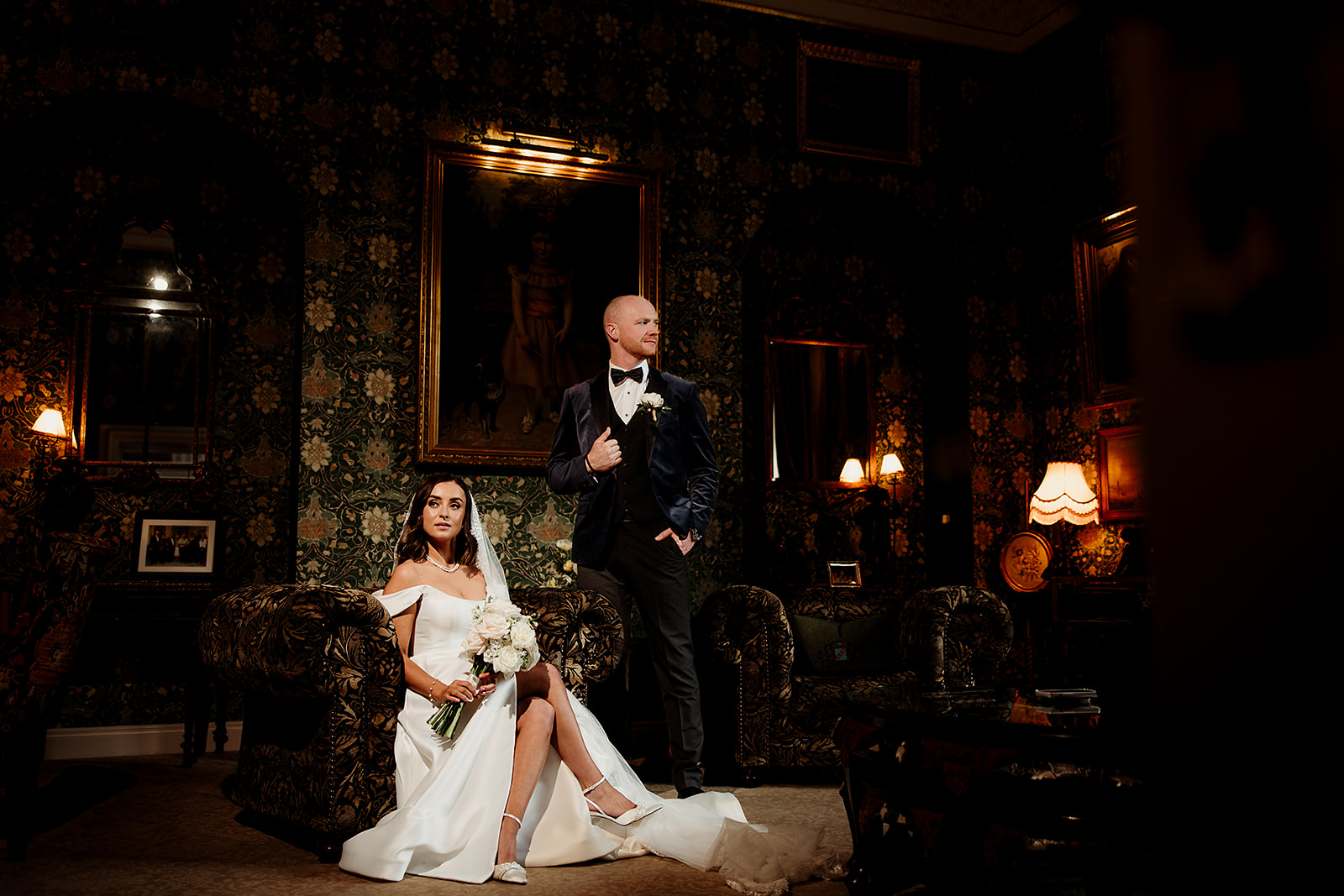 Emma and Conor in one of Cabra Castle’s warmly lit reception rooms