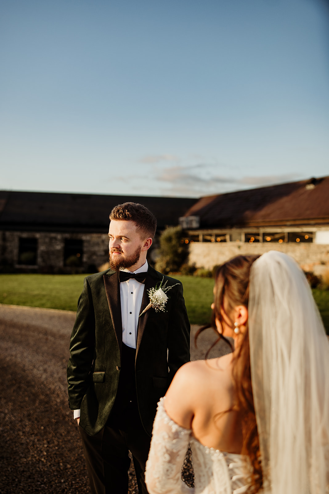 Sean with Jolene in warm afternoon light outside Boyne Hill House