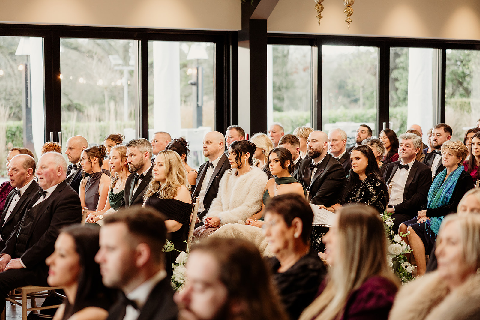 Guests watching Ciara and Dara’s wedding ceremony at Cabra Castle