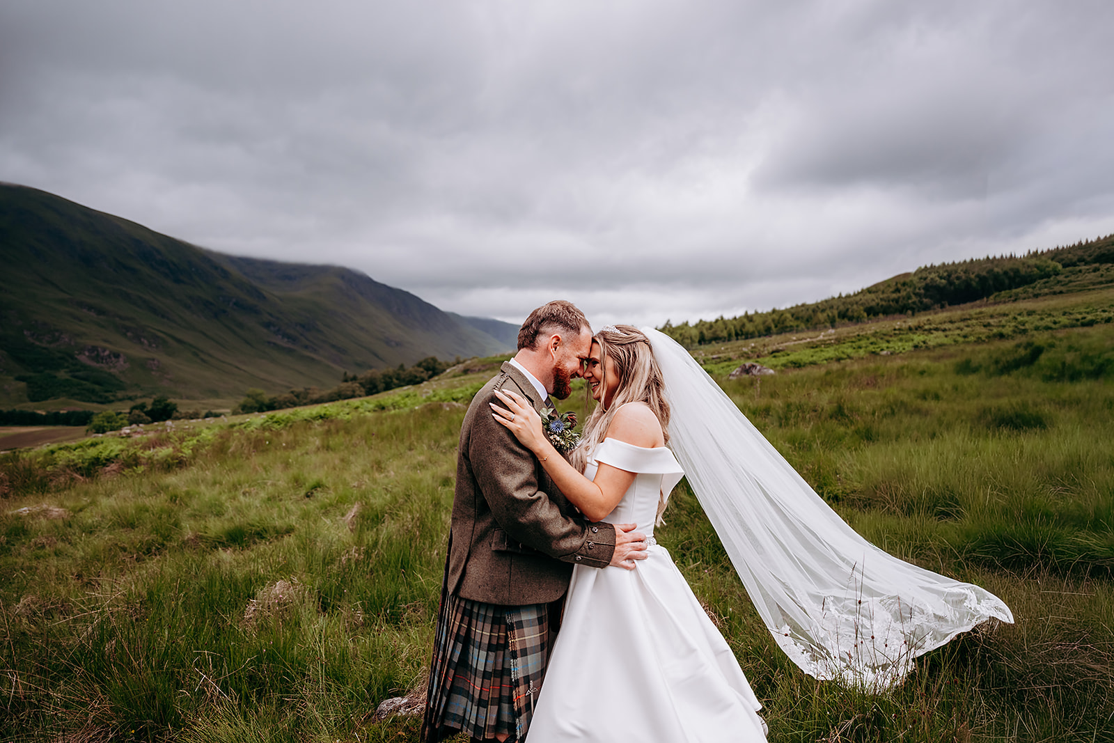 Bride and groom among the hills at Glen Clova
