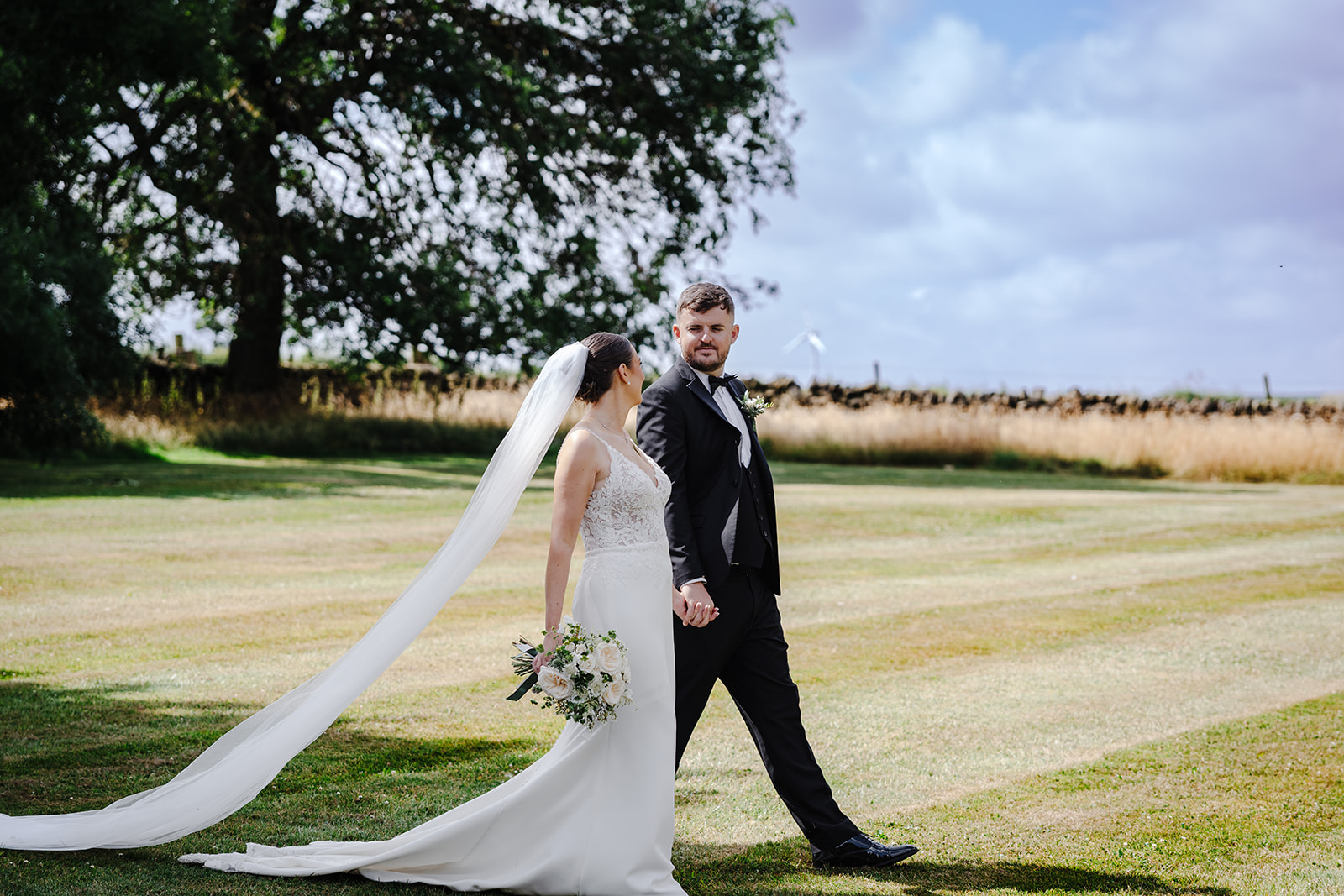 Lydia and Jordan beneath the trees at Spicer Manor