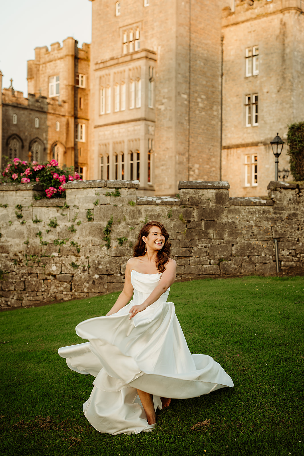 Olivia laughing in the evening light outside Markree Castle.
