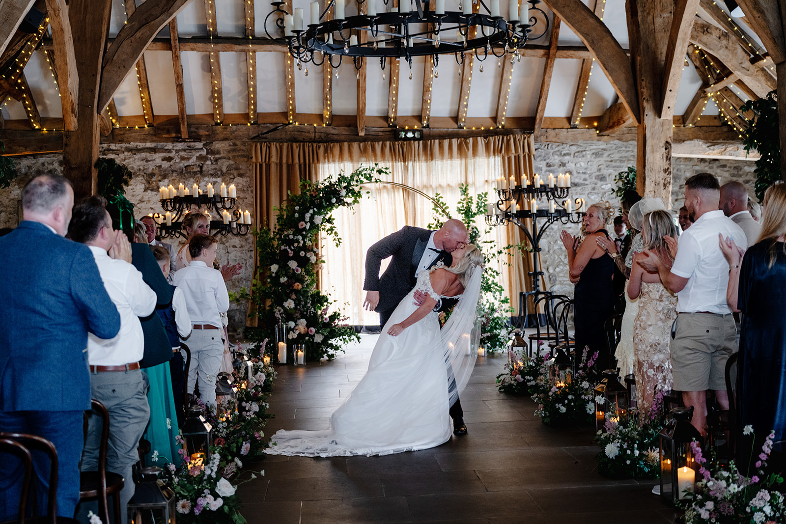 Katie and Lucas ceremony beneath the beams at Tithe Barn Bolton Abbey