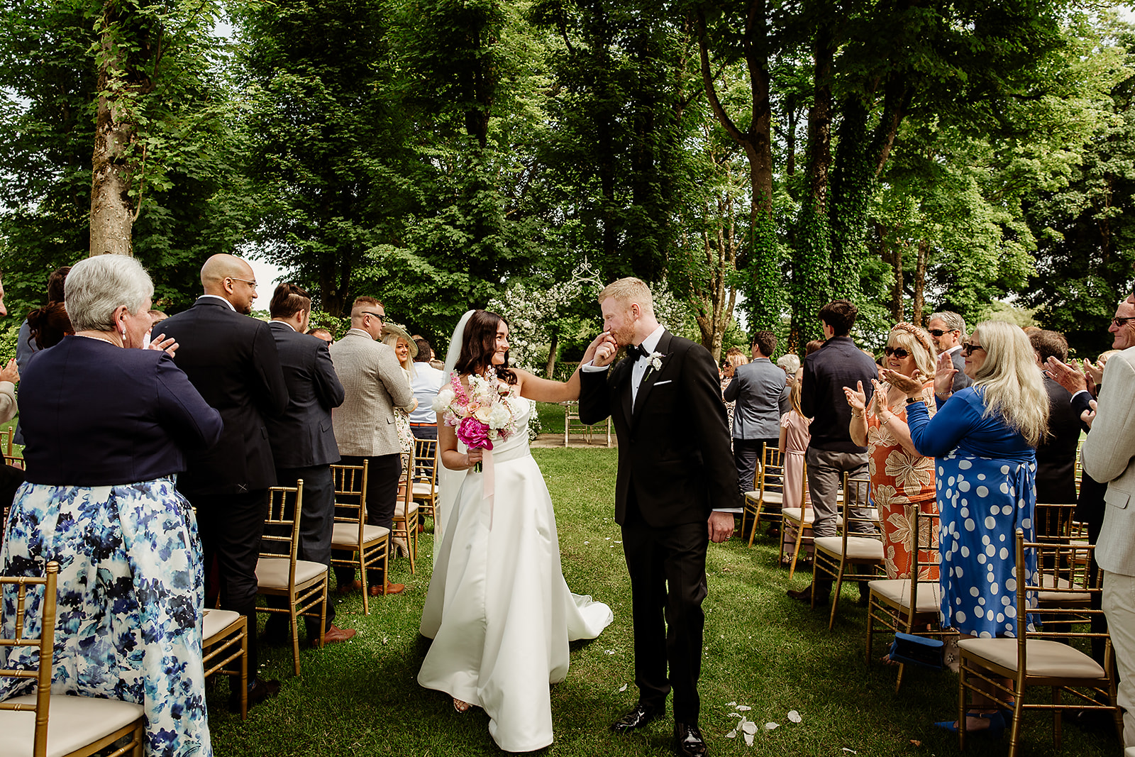 Corrine and David celebrating with their guests after the ceremony