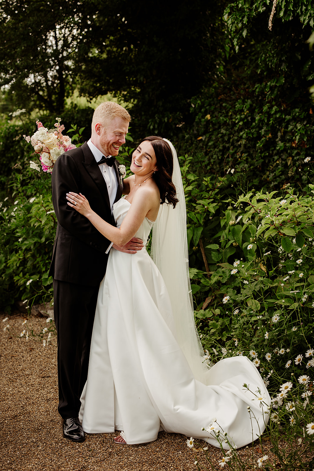 Corrine and David laughing together in the gardens