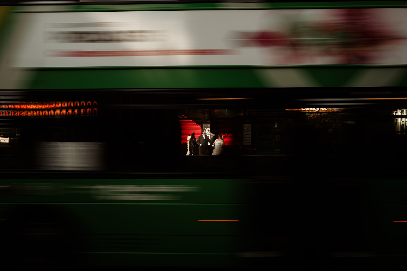 Aoife and Dean glimpsed through the window of a passing Dublin bus